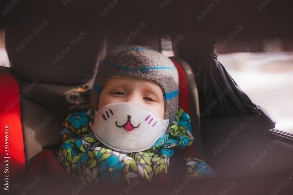 girl sitting in a respirator during coronavirus infection