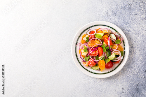 Vegetable salad. Panzanella traditional food of Italy with tomatoes and bread.