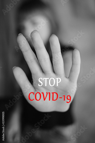stop coronovirus girl with hand of protest