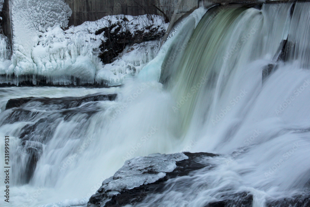 Frozen waterfall flow from an electrical barrage