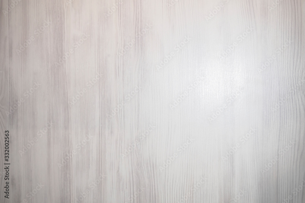 White wooden texture board, beige background.