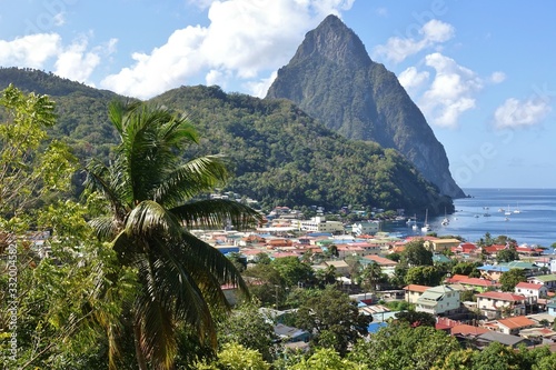 A view across the town of Soufriere towards the Pitons and the Caribbean Sea in St Lucia photo
