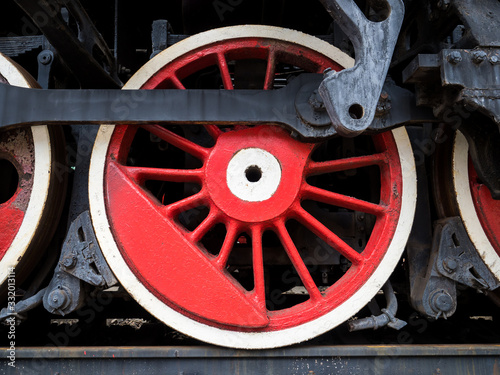 Red wheels of the black locomotive