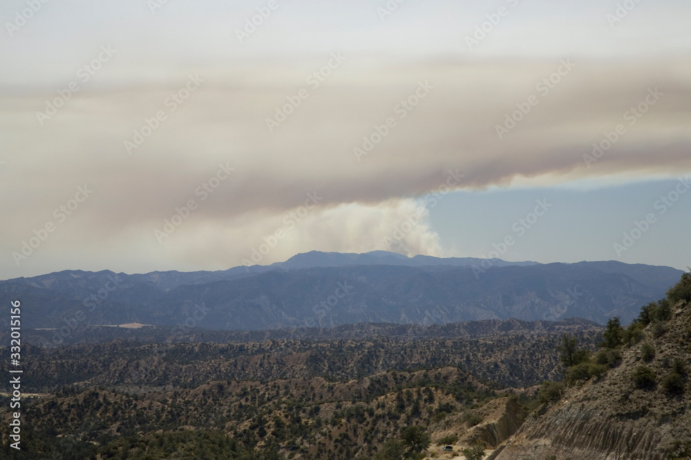 Fototapeta premium A California wildfire viewed from Lockwood Valley, Highway 33, near Ojai, California
