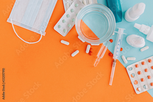 Set of pills and bottles of nose drops for treatment various viruses symptoms. Treatment of seasonal allergic rhinitis or flu.