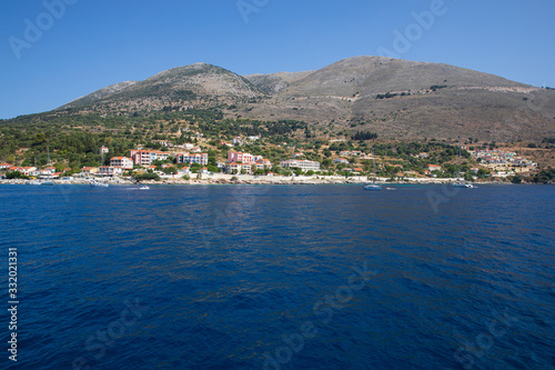 Greece, Kastos island in summer view from the sea. photo