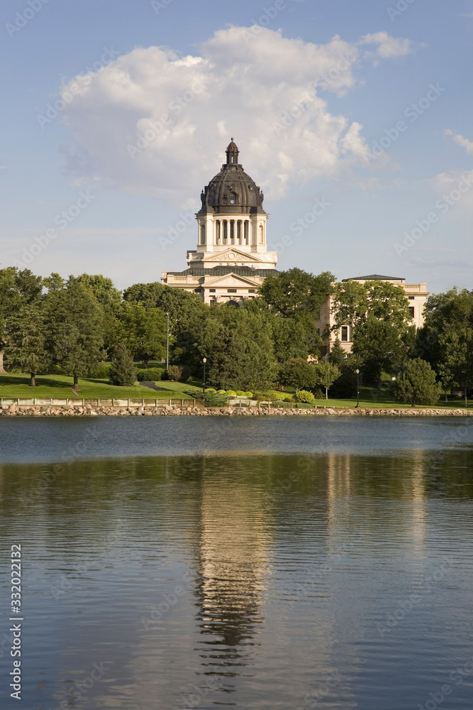 Lake reflection of South Dakota State Capitol and complex, Pierre, South Dakota, built between 1905 and 1910