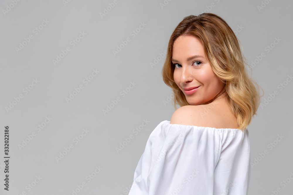 Portrait of young pretty cheerful girl smiling looking at camera over monochromatic background. Portrait of young pretty cheerful girl smiling looking at camera over monochromatic background.