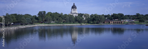 Panoramic view of lake with view of South Dakota State Capitol and complex, Pierre, South Dakota, built between 1905 and 1910