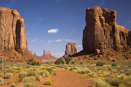 Red buttes and colorful spires of Monument Valley Navajo Tribal Park, Southern Utah near Arizona border