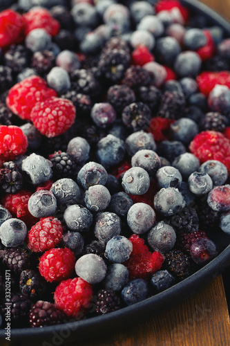frozen raspberries  blackberries and blueberries close up