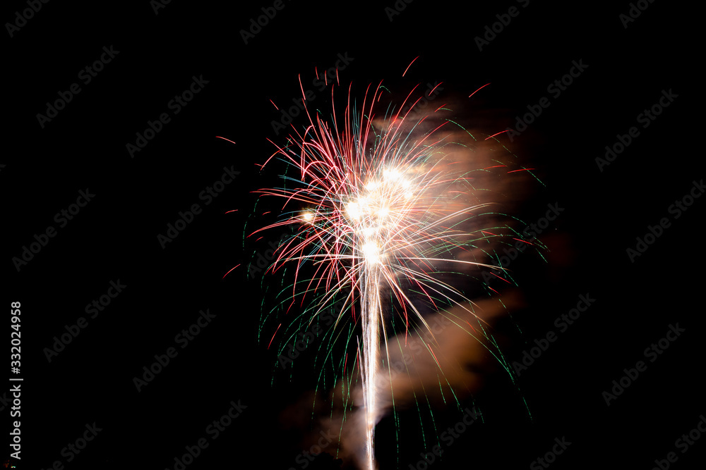 New Years or 4th of July Fireworks in a Night Sky New Years or 4th of July Fireworks in a Night Sky