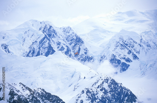 ÒSuper CubÓ Piper bush airplane flies in St. Elias National Park and Preserve, Wrangell Mountains, Wrangell, Alaska
