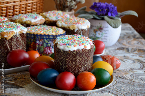 colored eggs and Easter cake on the table