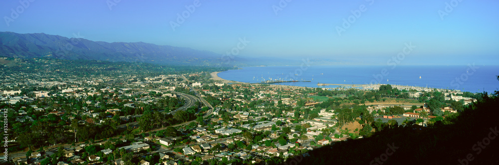 Panoramic aerial view of Santa Barbara California and Pacific Ocean with harbor in view