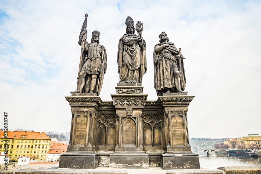 Prague, Czech republic - March 19, 2020. Statues of Charles Bridge without tourist during Covid-19 travel ban