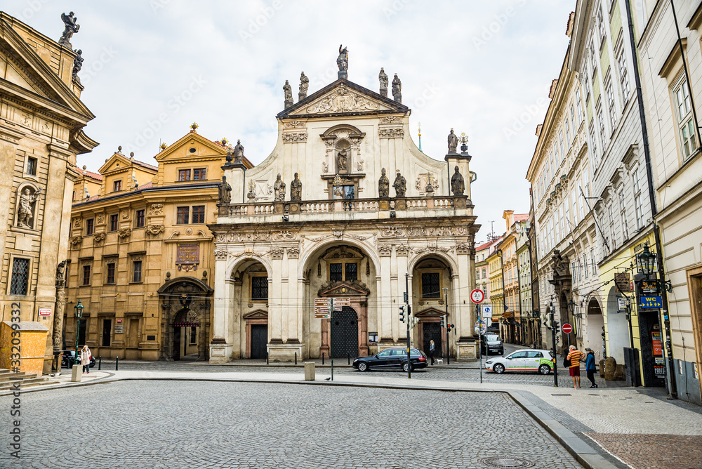 Prague, Czech republic - March 19, 2020. Square Krizovnicke namesti in front of entrance to Charles Bridge without tourists during Covid-19 travel ban