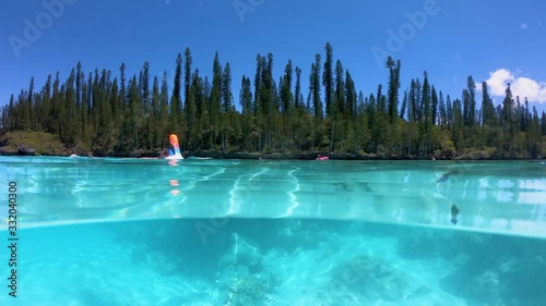 Natural swimming pool in the golden bay on the Isle of Pines in New Caledonia.