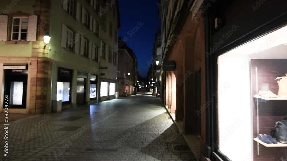 Perspective view over closed shops on pedestrian street as the authorities imposes emergency measures to combat the Coronavirus COVID-19 outbreak Perspective view over closed shops on pedestrian street as the authorities imposes emergency measures to combat the Coronavirus COVID-19 outbreak