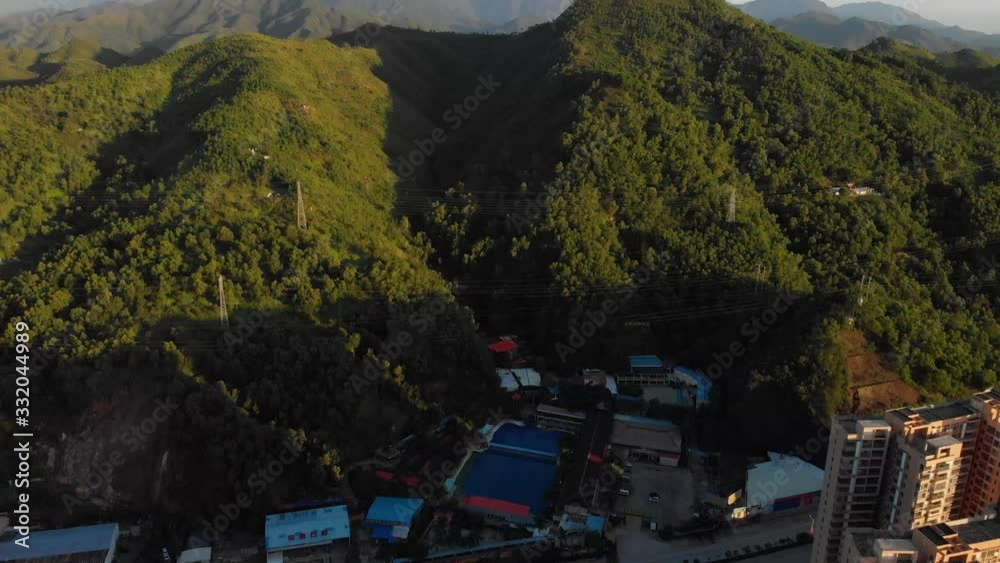 village in tropical forrest mountains Haifeng China drone shot village in tropical forrest mountains Haifeng China drone shot