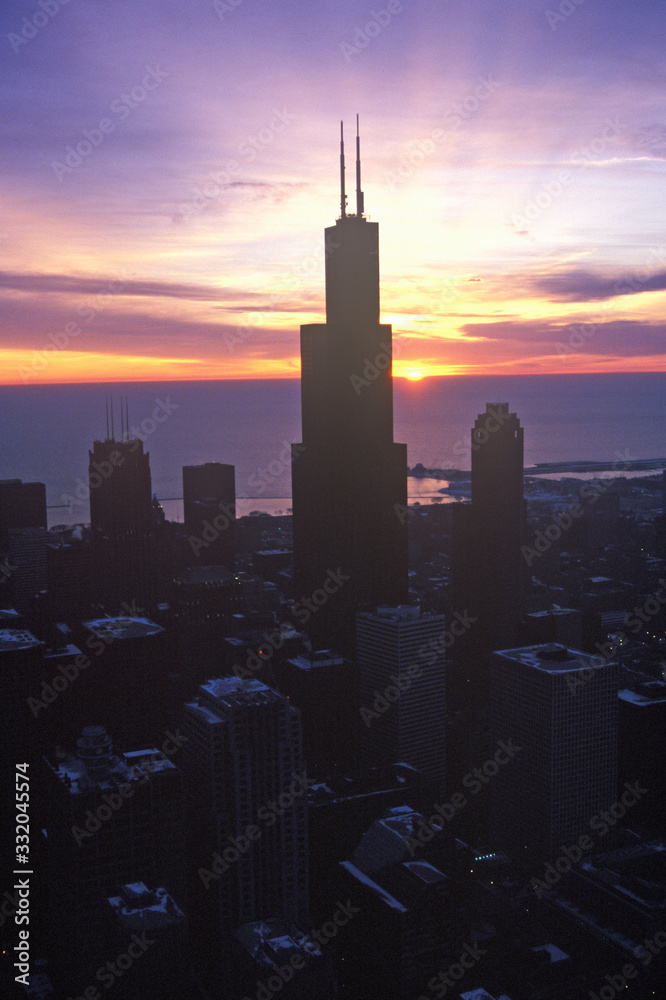 John Hancock Building towers above Chicago Skyline at Sunrise, Chicago, Illinois