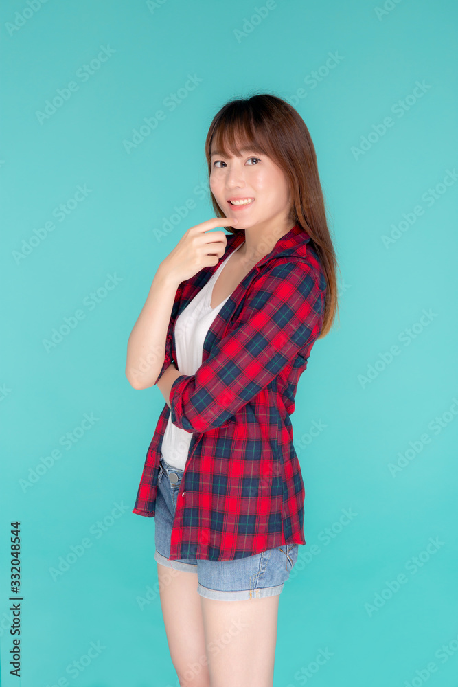 Beautiful portrait young asian woman wear clothes fashion travel thinking idea and enjoy summer holiday isolated blue background, girl smiling confident and cheerful, travel in vacation concept. Beautiful portrait young asian woman wear clothes fashion travel thinking idea and enjoy summer holiday isolated blue background, girl smiling confident and cheerful, travel in vacation concept.