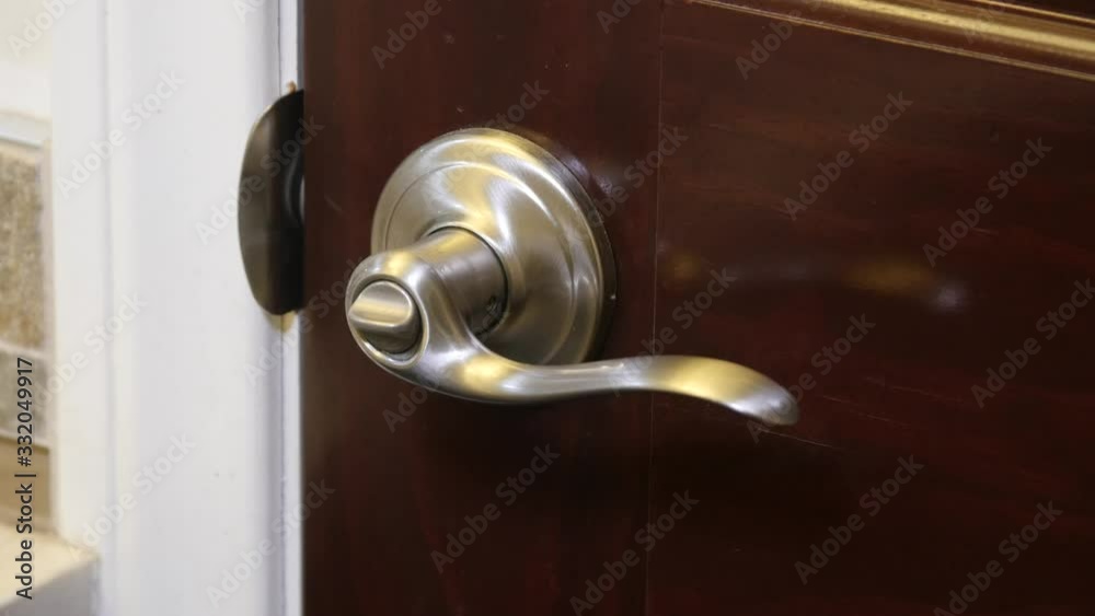 Black man using door handle