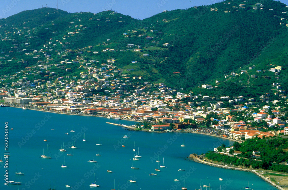 Cliff top view of a seaport and village.  St Thomas West Indies Caribbean