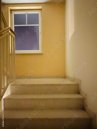 illuminated stairwel. staircase in the old house. staircase arpartment. stairs with banister. withe staircase in yellow house. stairs window yellow house. empty corridor with staircase. stairs up