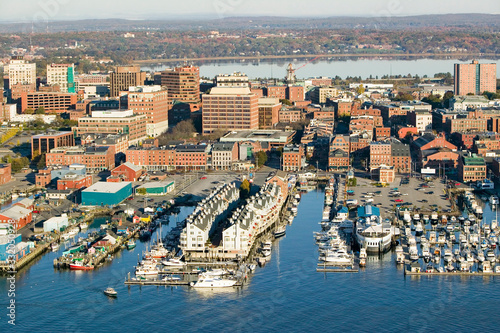 Aerial of downtown Portland Harbor and Portland Maine with view of Maine Medical Center, Commercial street, Old Port and Back Bay.
