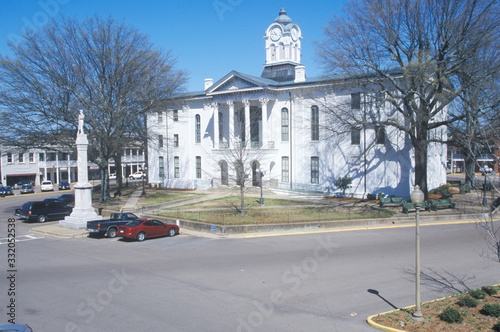 Lafayette County Court House in center of historic old southern town and storefronts of Oxford, MS photo