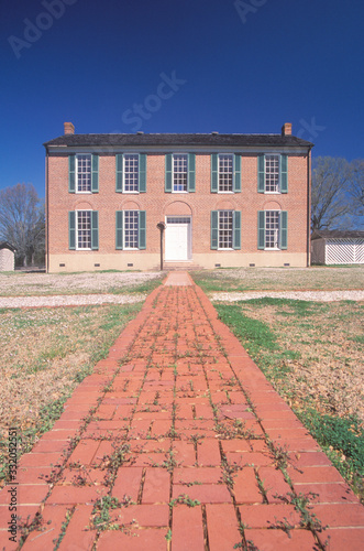 Red brick sidewalk leading to Little Red Schoolhouse in Richland, MS, birthplace of Freemasonry's Order of Eastern Star photo