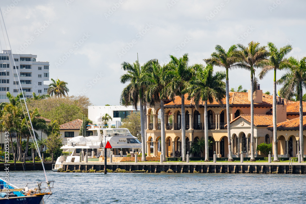 Luxury Fort Lauderdale mansions with palm trees