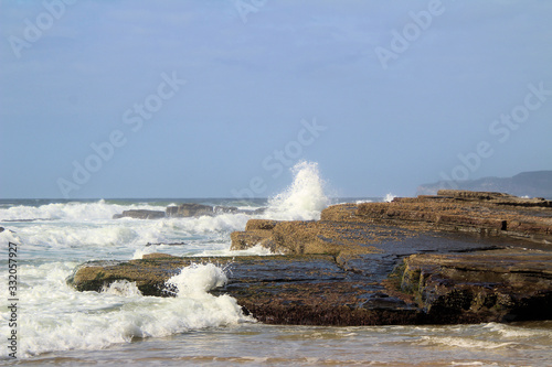 Waves Breaking on Susan Gilmore Beach at Low Tide
