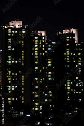 Modern Apartment Block at Night © adibella6370