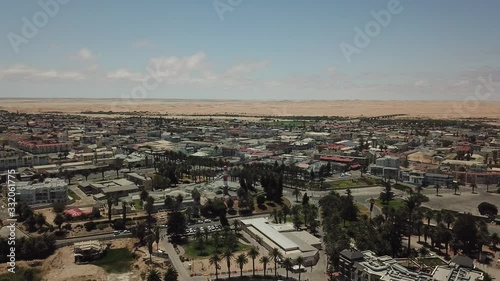 Wallpaper Mural 4K aerial drone video of Swakopmund main town beach, Atlantic Ocean coastline, west coast yellow sand, emerald water, Namib Desert and town panorama in Namibia, southern Africa Torontodigital.ca