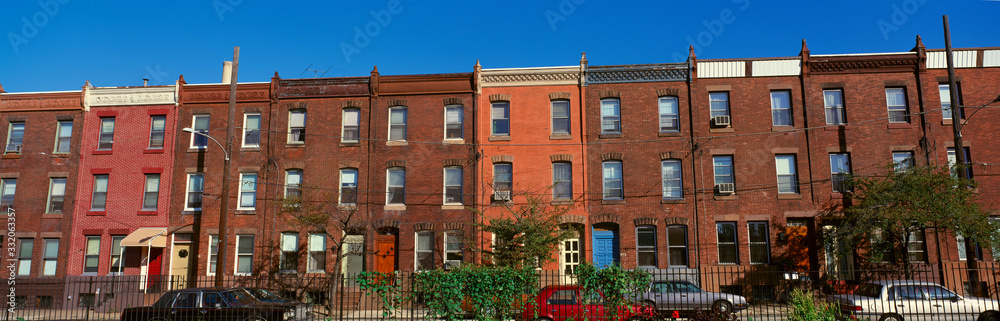 Panoramic morning view of red brick row houses of Philadelphia, PA Panoramic morning view of red brick row houses of Philadelphia, PA