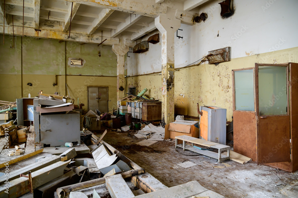 Photo of a garbage dump in a slum building of an abandoned factory Photo of a garbage dump in a slum building of an abandoned factory