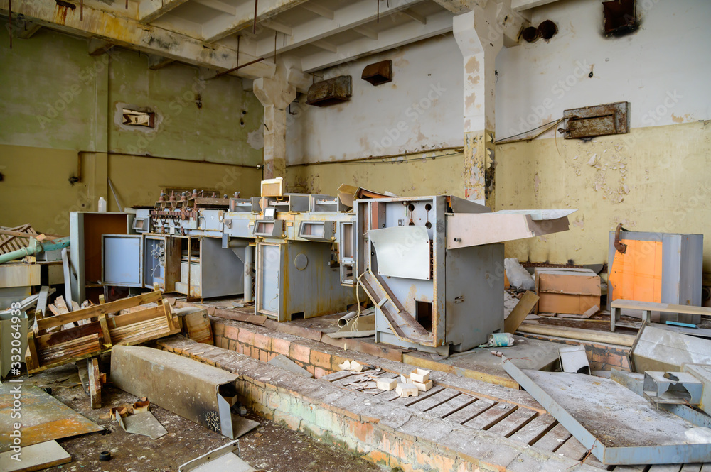 Photo of a garbage dump in a slum building of an abandoned factory Photo of a garbage dump in a slum building of an abandoned factory