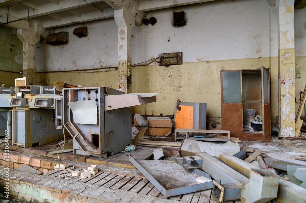 Photo of a garbage dump in a slum building of an abandoned factory Photo of a garbage dump in a slum building of an abandoned factory