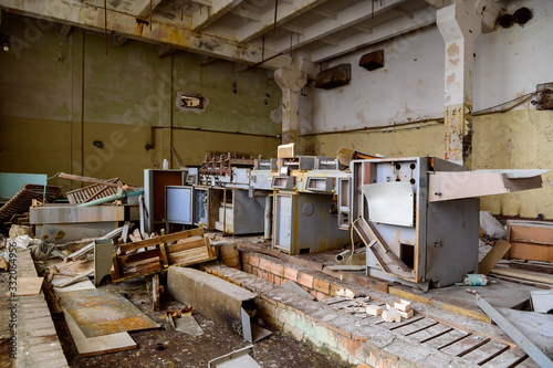 Photo of a garbage dump in a slum building of an abandoned factory