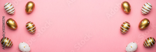 Easter background pink. Easter composition: golden shine decorated eggs in basket. For greeting card, promotion, poster