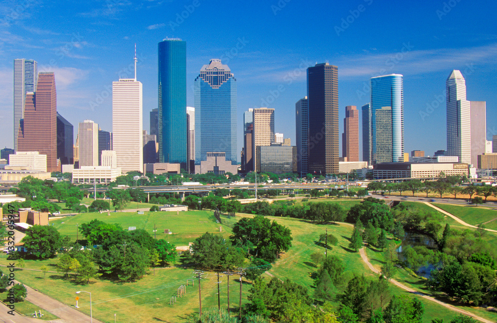 Houston, TX skyline in the afternoon with Memorial Park in foreground
