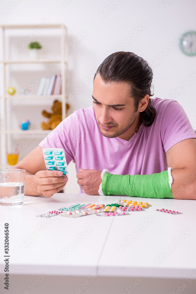 Injured young man at home Injured young man at home