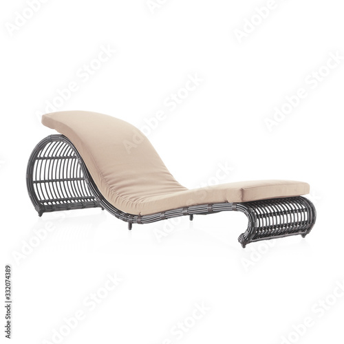 Obraz na plátne Outdoor Wicker Pool Chaise Lounge Chair Isolated on White Background