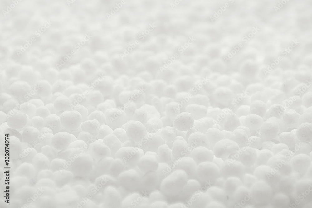 Naklejka premium White round urea fertilizer closeup. Chemical fertilizer carbamide. Mineral fertilizers are white balls of carbamide (urea). Background, texture.