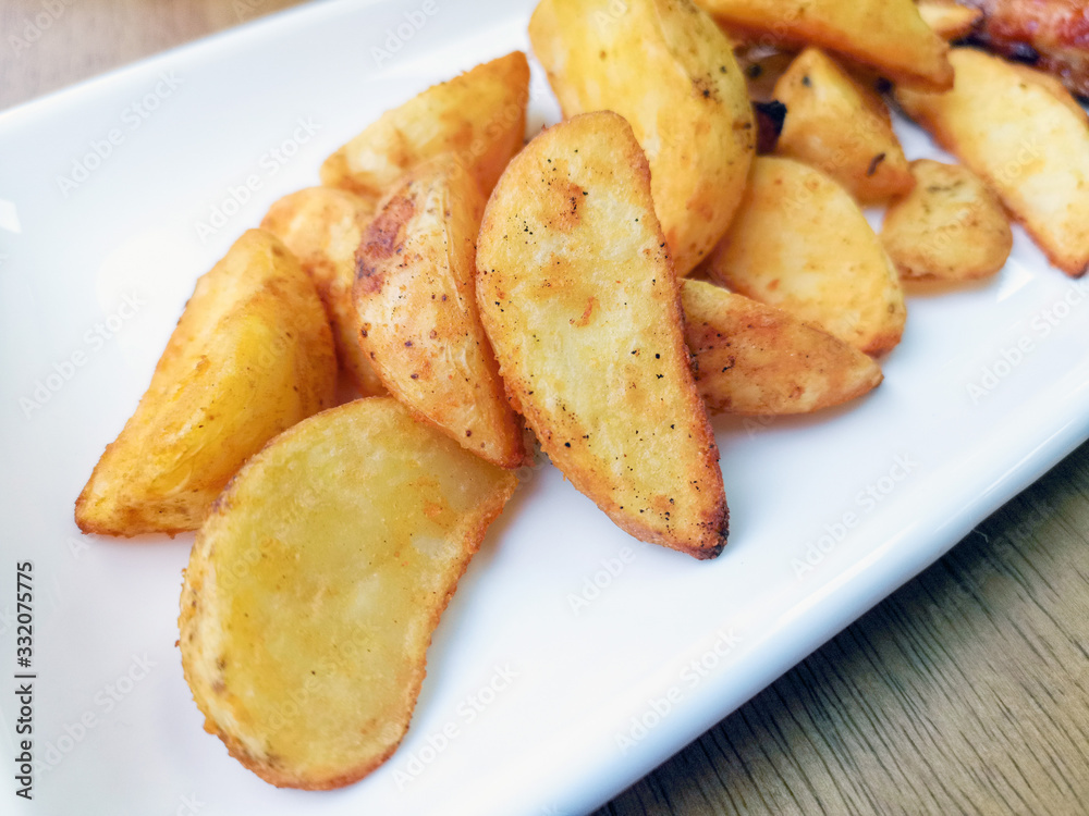 Golden French fries potatoes ready to be eaten Golden French fries potatoes ready to be eaten