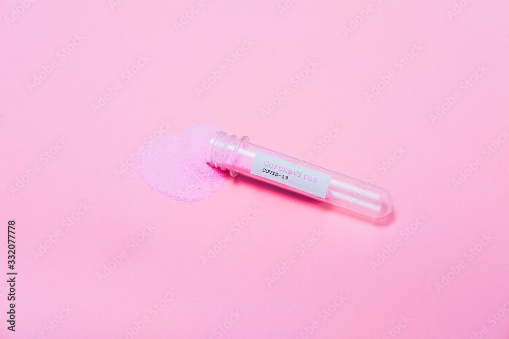 COVID-19 test and laboratory sample with pink glitter for diagnosis new Coronavirus infection on pink background. Flat lay, top view. Minimal. COVID-19 test and laboratory sample with pink glitter for diagnosis new Coronavirus infection on pink background. Flat lay, top view. Minimal.