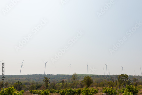 Windmills for electric power © watcharapol