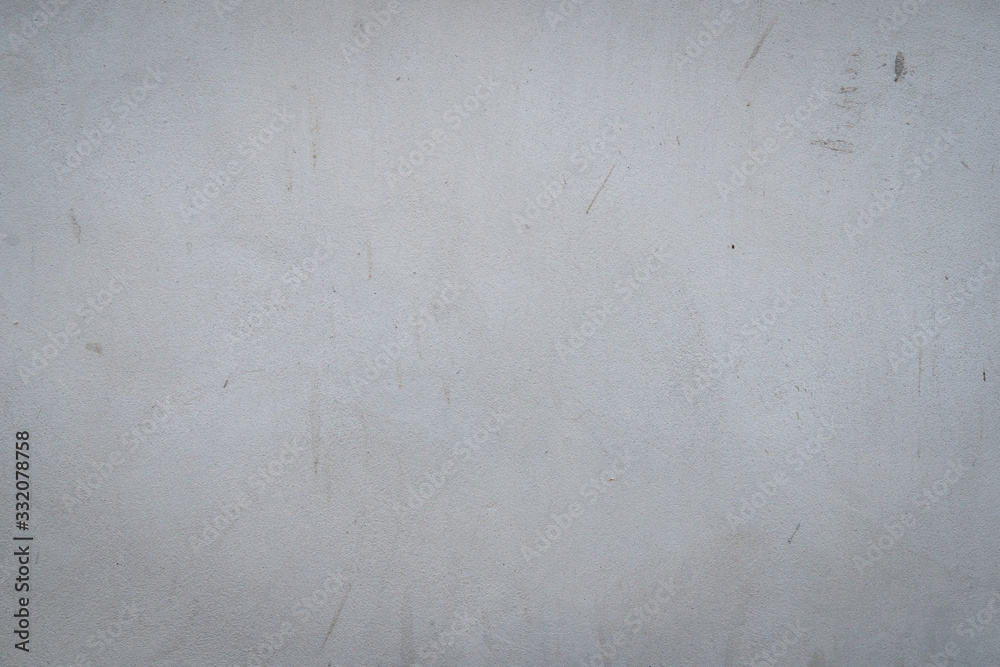 Texture of gray concrete wall surface. Some crack and scratch, suitable for use as a pattern or  background image.